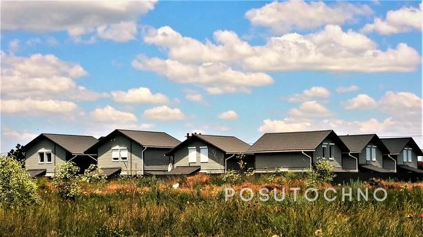 The new two-storey wooden house for a comfortable family hol