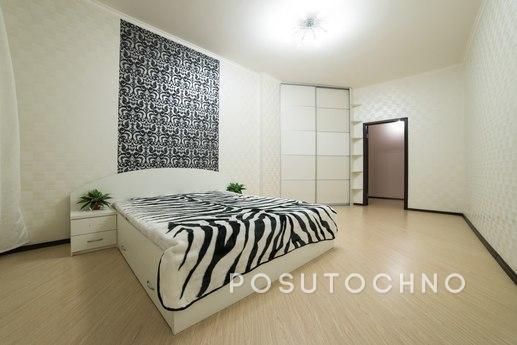 Furniture and other amenities such as a sofa, bed, kitchen, 