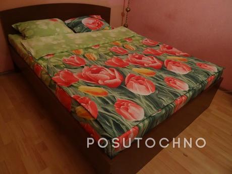 Night, clock, day in a cozy comfortable apartment, located i