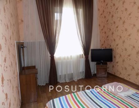 The apartment is located in the city center, on the ground f
