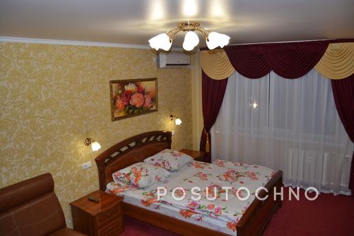 a LCD TV with more than 100 programs, DVD player, telephone,