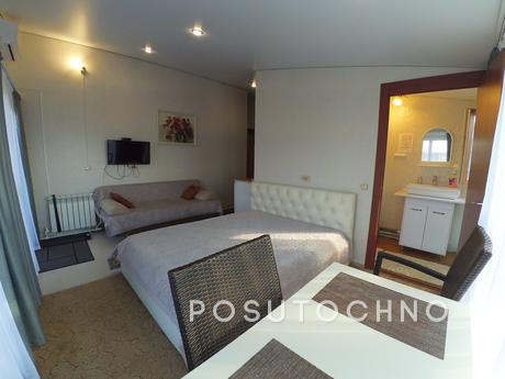 Panoramic 4-seater with a balcony, Kazan - apartment by the day