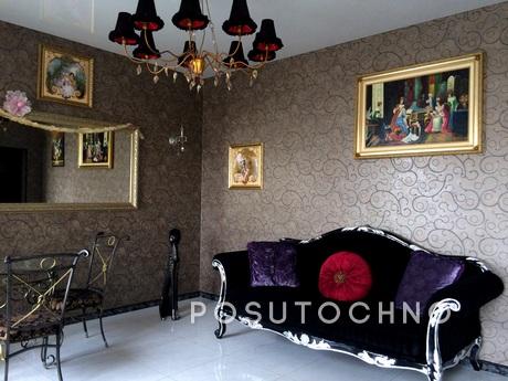 The apartment is located in the heart of the city, 5 minutes