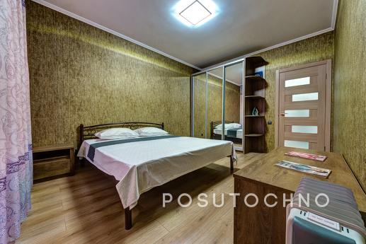 An apartment with great panoramic windows overlooking the me
