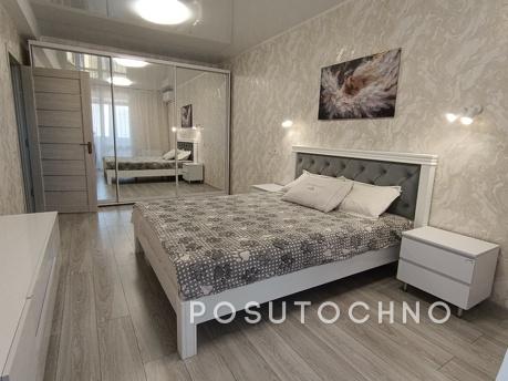 This apartment is in a new building, across the street from 
